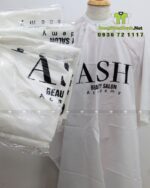 Áo choàng cắt tóc thiết kế vừa vặn dành cho các beauty salon, in logo ASH.