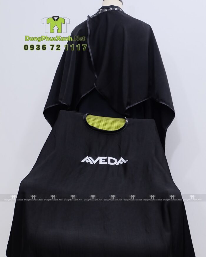 Áo choàng cắt tóc thiết kế nút gài linh hoạt, in logo Aveda.