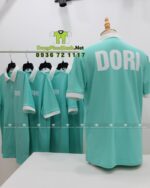 Áo thun đồng phục nhân viên màu xanh mint tươi sáng, in logo DORI.