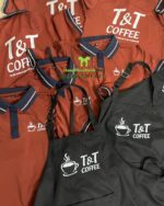 Bộ đồng phục quán cà phê phong cách chuyên nghiệp, in logo T&T Coffee.