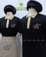 Bộ đồng phục nhân viên tiệm trà sữa thiết kế hiện đại sang trọng, in logo Tiệm Trà Nhà Lam.