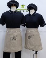 Bộ đồng phục nhân viên tiệm trà sữa thiết kế hiện đại sang trọng, in logo Tiệm Trà Nhà Lam.