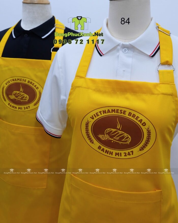 Tạp dề đồng phục tiệm bánh mì thiết kế màu vàng bắt mắt, in logo Vietnamese Bread - Banh mi 247.