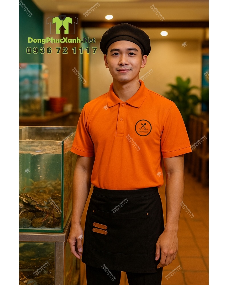 Áo thun đồng phục nhân viên quán ăn in logo Ốc Tiêu Vinwonder.(1) Áo thun đồng phục nhân viên quán ăn màu cam năng động, in logo Ốc Tiêu Vinwonder.