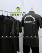Áo đồng phục nhân viên màu đen đơn giản, in logo Trần Nguyên Decor.