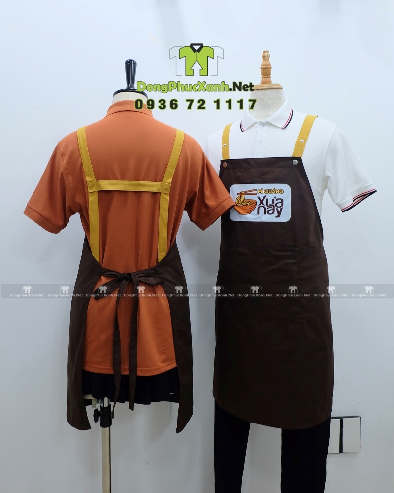 Tạp dề đồng phục nhân viên quán ăn in logo Mì Quảng Xưa Nay. Tạp dề đồng phục nhân viên quán ăn thiết kế chữ H, in logo Mì Quảng Xưa Nay.