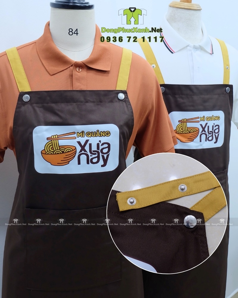 Tạp dề đồng phục nhân viên quán ăn in logo Mì Quảng Xưa Nay. Tạp dề đồng phục nhân viên quán ăn thiết kế chữ H, in logo Mì Quảng Xưa Nay.