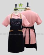 Tạp dề nail dành cho nhân viên màu đen chất liệu vải micro, in logo Starlight - Nails and Spa