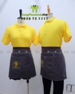 Tạp dề ngắn đồng phục màu xám dành cho nhân viên, in logo Vạn Huệ Garden.