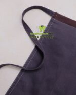 Tạp dề ngắn đồng phục màu xám dành cho nhân viên, in logo Vạn Huệ Garden.