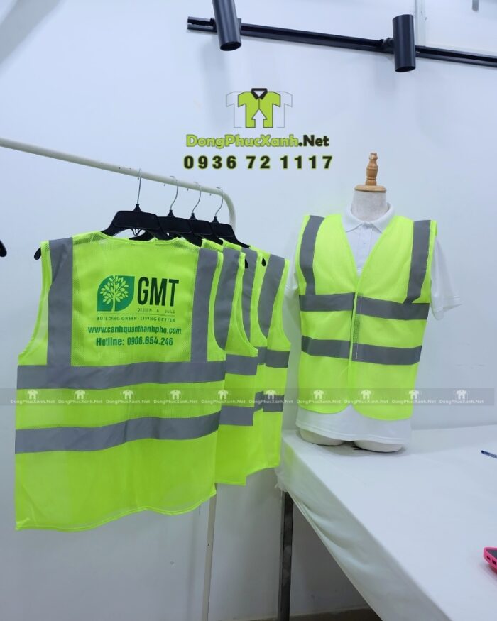Áo gile phản quang màu vàng chanh chất liệu vải lưới in logo GMT nổi bật