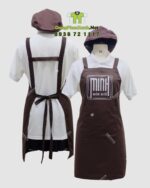 Tạp dề đồng phục màu nâu in logo Minh Món Huế rõ nét