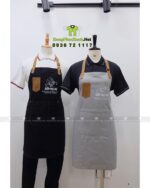 Tạp dề nhân viên Bếp Mẹ Bơ màu đen và kem có túi