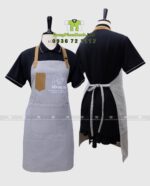 Tạp dề nhân viên Bếp Mẹ Bơ màu đen và kem có túi