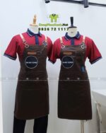 Tạp dề nhân viên Gia Huy Coffee màu nâu phối da in logo.