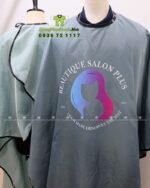 Áo choàng tóc đồng phục Beautique Salon Plus vải dù chống thấm màu xám