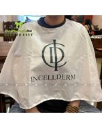 Áo choàng nhuộm tóc Incellderm vải dù màu trắng in logo