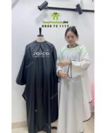 Áo choàng tóc in logo Joico vải dù màu đen dài tay chống bám dính