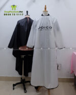 Áo choàng tóc in logo Joico vải dù màu đen dài tay chống bám dính