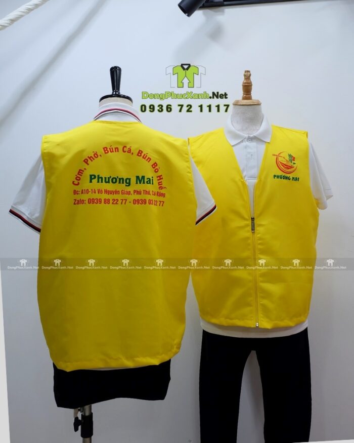 Đồng phục gile gió màu vàng chất liệu vải dù chéo in logo Phương Mai