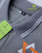 Áo thun đồng phục công ty Starlight vải cá sấu poly màu xám.