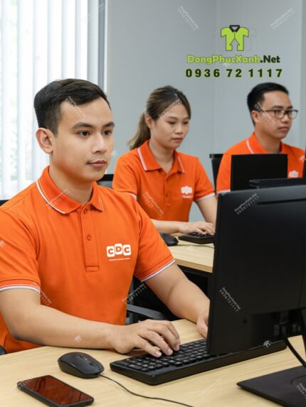 Áo thun đồng phục công ty CDC màu cam vải cá sấu 65/35.