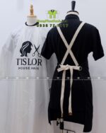 Áo choàng tóc in logo Tislor màu đen và trắng vải dù.
