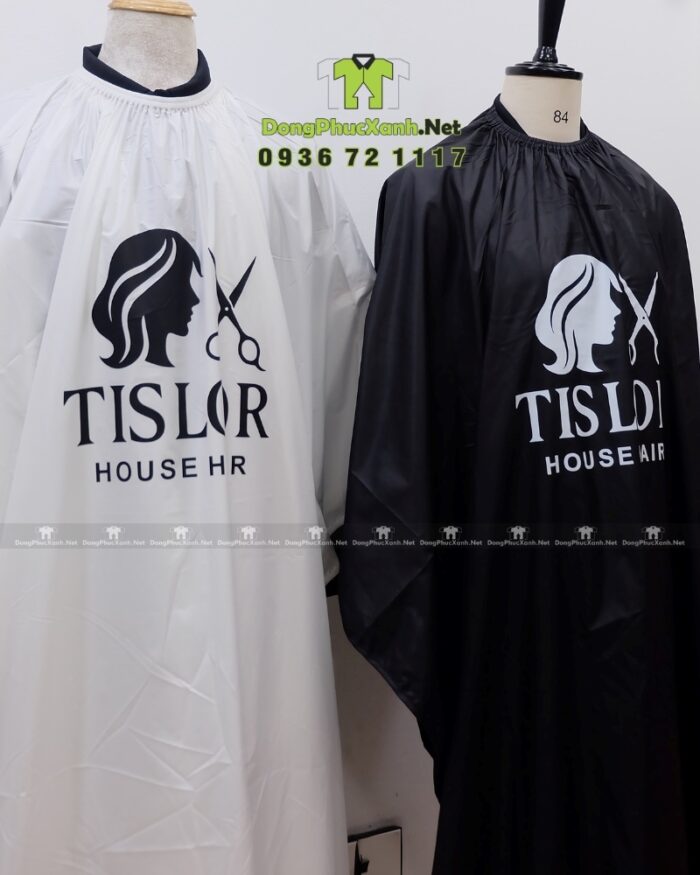 Áo choàng tóc in logo Tislor màu đen và trắng vải dù.