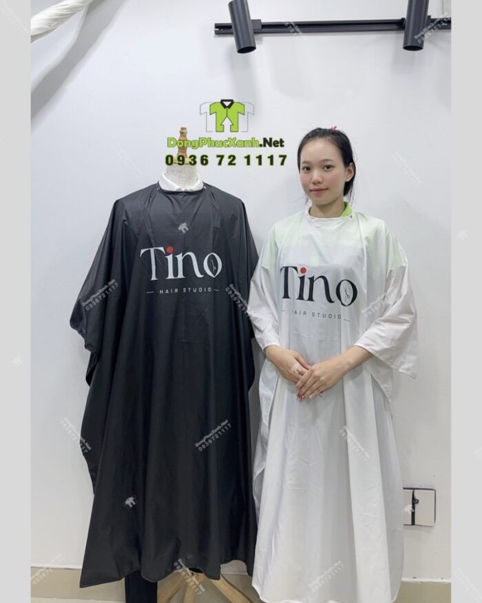 Áo choàng tóc in logo Tino màu đen và trắng, chất liệu vải dù