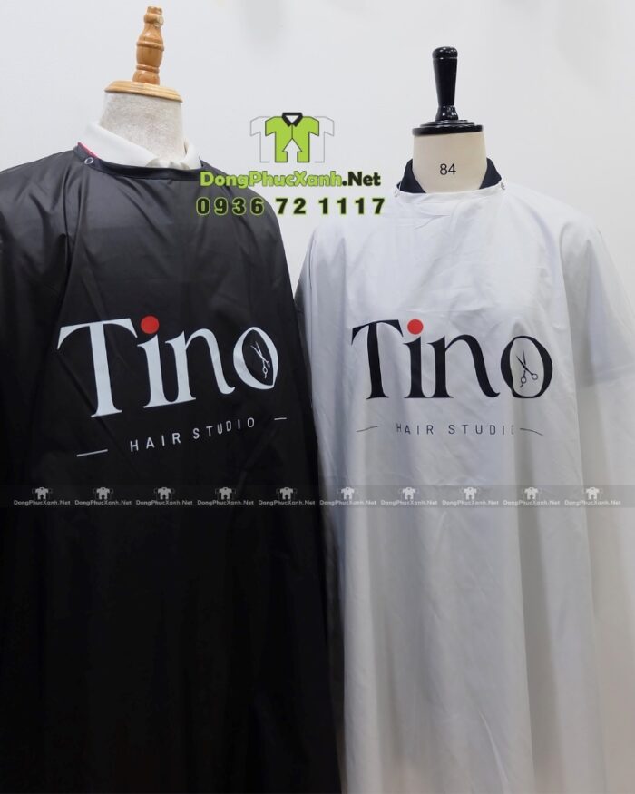 Áo choàng tóc in logo Tino màu đen và trắng, chất liệu vải dù