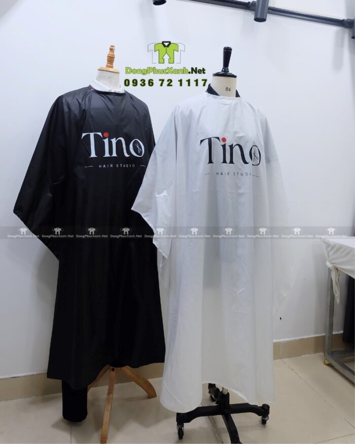 Áo choàng tóc in logo Tino màu đen và trắng, chất liệu vải dù