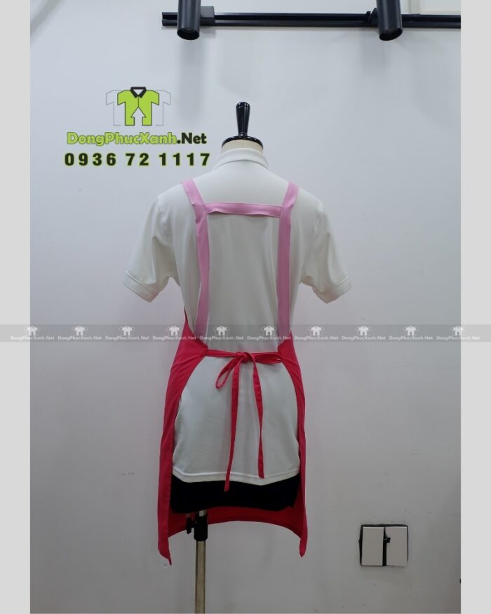 Tạp dề nail màu hồng vải kaki thun in logo Bemay Salon.