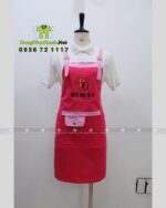 Tạp dề nail màu hồng vải kaki thun in logo Bemay Salon.
