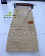 Đồng phục phục vụ The Malibu Hotel gồm tạp dề và nón vải kaki cotton màu be in logo