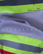 Cận cảnh vải kaki phối lưới may áo gile kỹ sư