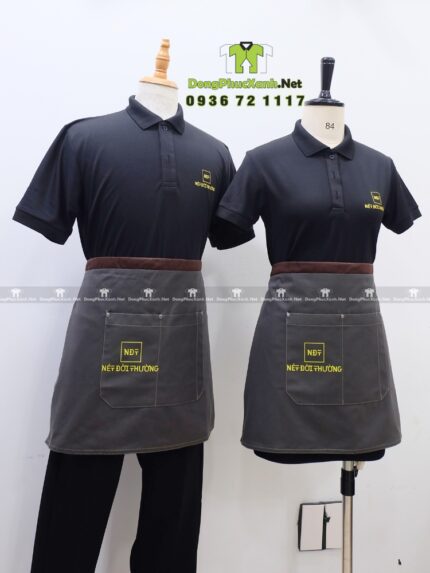 Đồng phục quán cafe thiết kế áo đen kết hợp tạp dề xám đậm mạnh mẽ